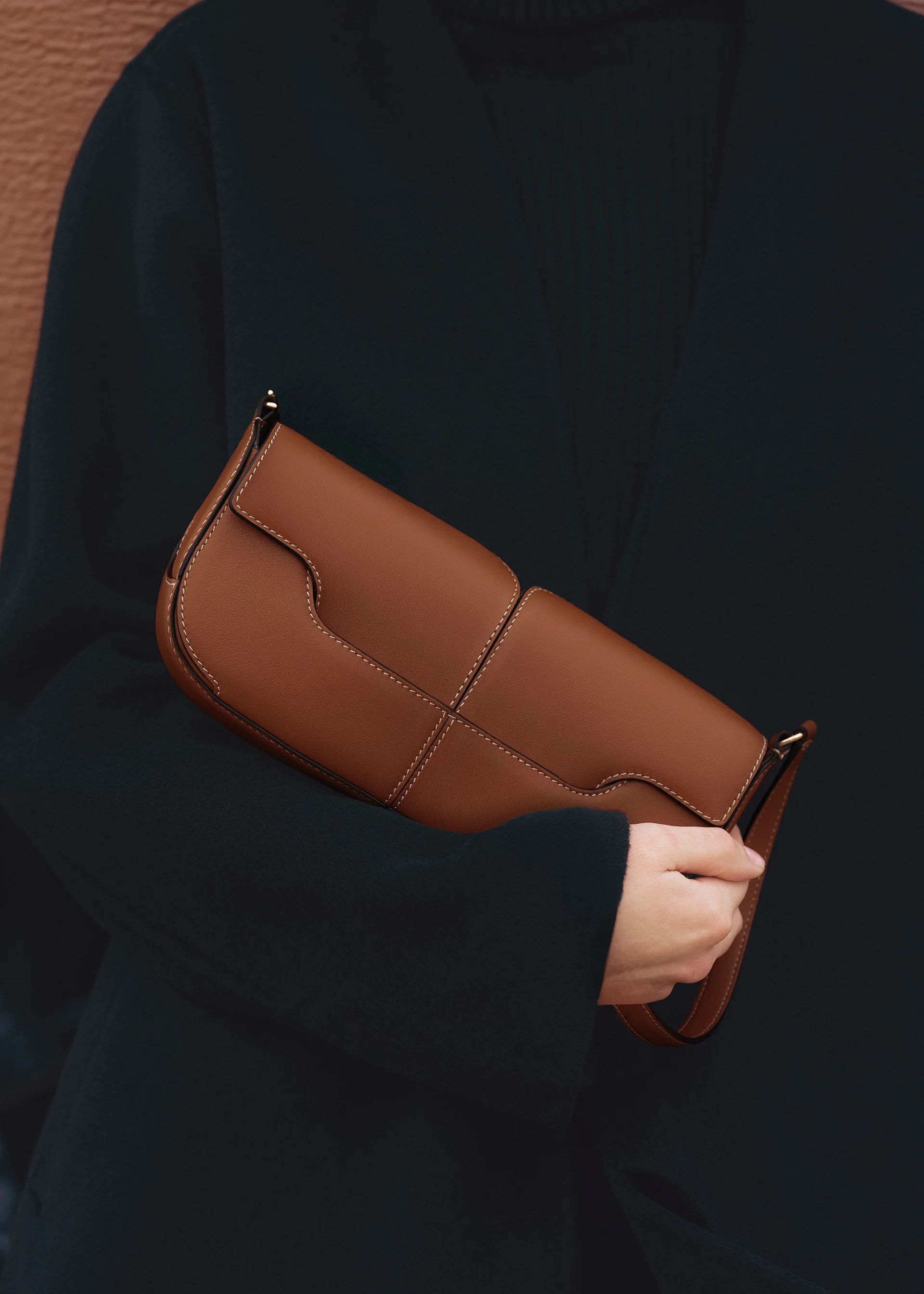 Polène Osmo — full-grain cognac leather, crafted in Ubrique